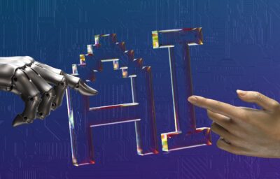 robot and human hands reaching toward ai text